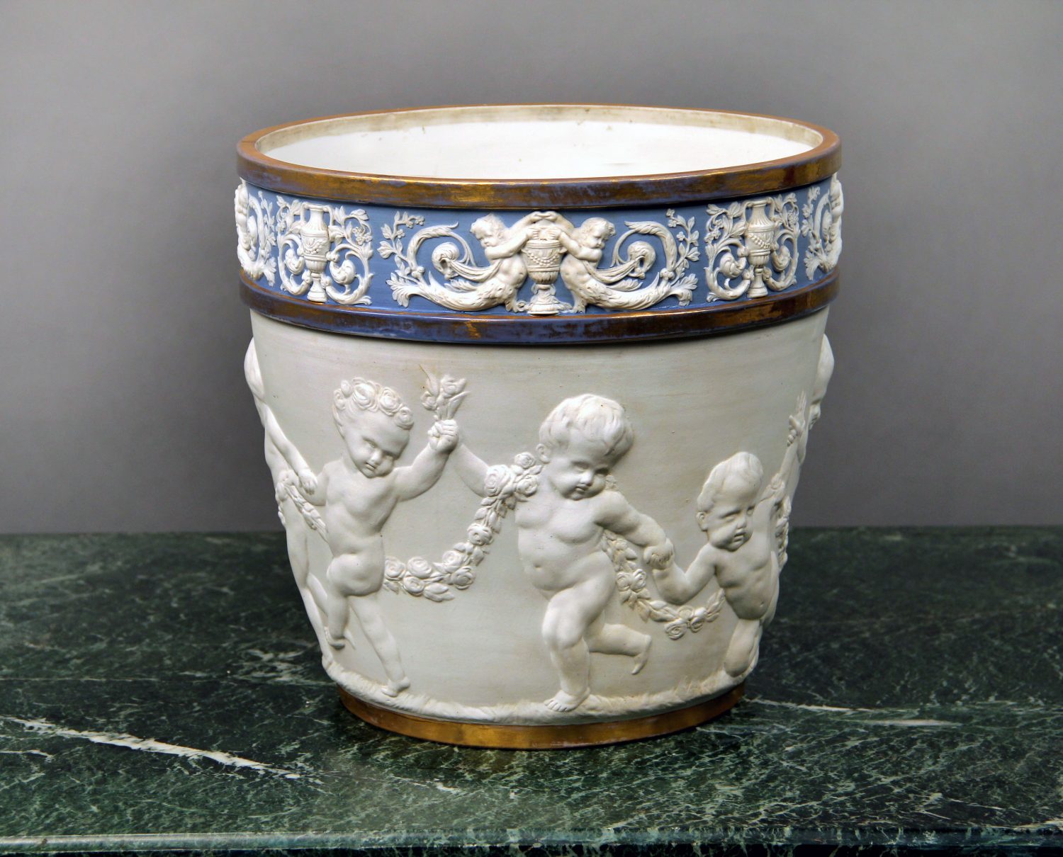 A Late 19th Century Sèvres Style Parcel-Gilt and Biscuit Porcelain Jardinière