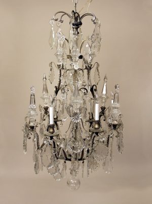 A Late 19th Century Silvered Bronze and Baccarat Crystal Twelve Light Chandelier