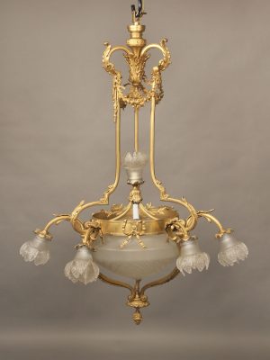 A Lovely Early 20th Century Gilt Bronze and Crystal Eight Light Chandelier