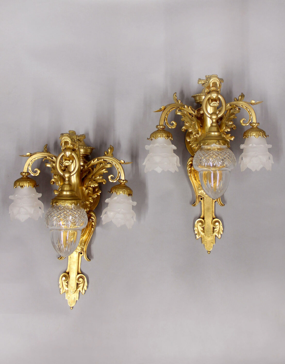 An Interesting Pair of Late 19th Century Gilt Bronze Three Light Dragon Sconces