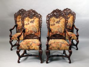 A Set of Four Large 19th Century Hand Carved Wood Highback Armchairs