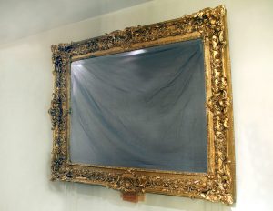 A Large and Fantastic Late 19th Century Carved Giltwood Mirror