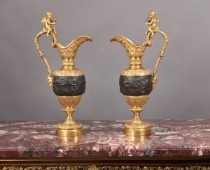 A Pair of Late 19th Century Gilt Bronze and Patinated Bronze Ewers