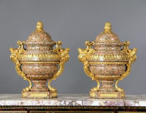 A Rare Pair of Late 19th/Early 20th Century French Bronze Mounted Pink Granite Urns