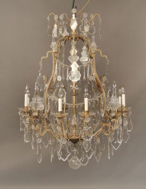 A Very Fine Late 19th Century Gilt Bronze and Crystal Eight Light Chandelier
