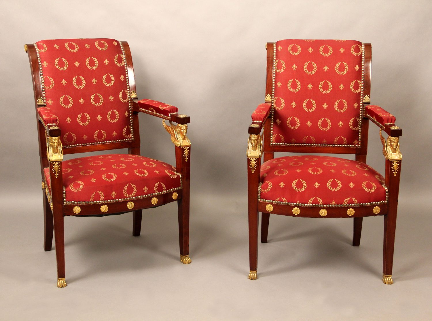 A Fine Pair of Early 20th Century Gilt Bronze Mounted Empire Style Arm Chairs
