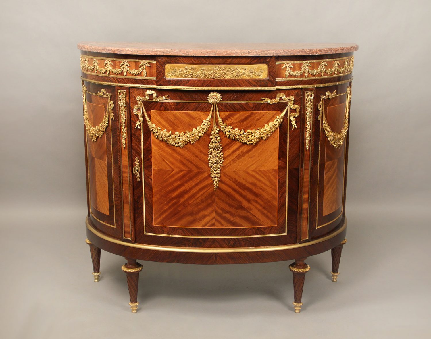 A Late 19th Century Gilt Bronze Mounted Kingwood Louis XVI Style Cabinet