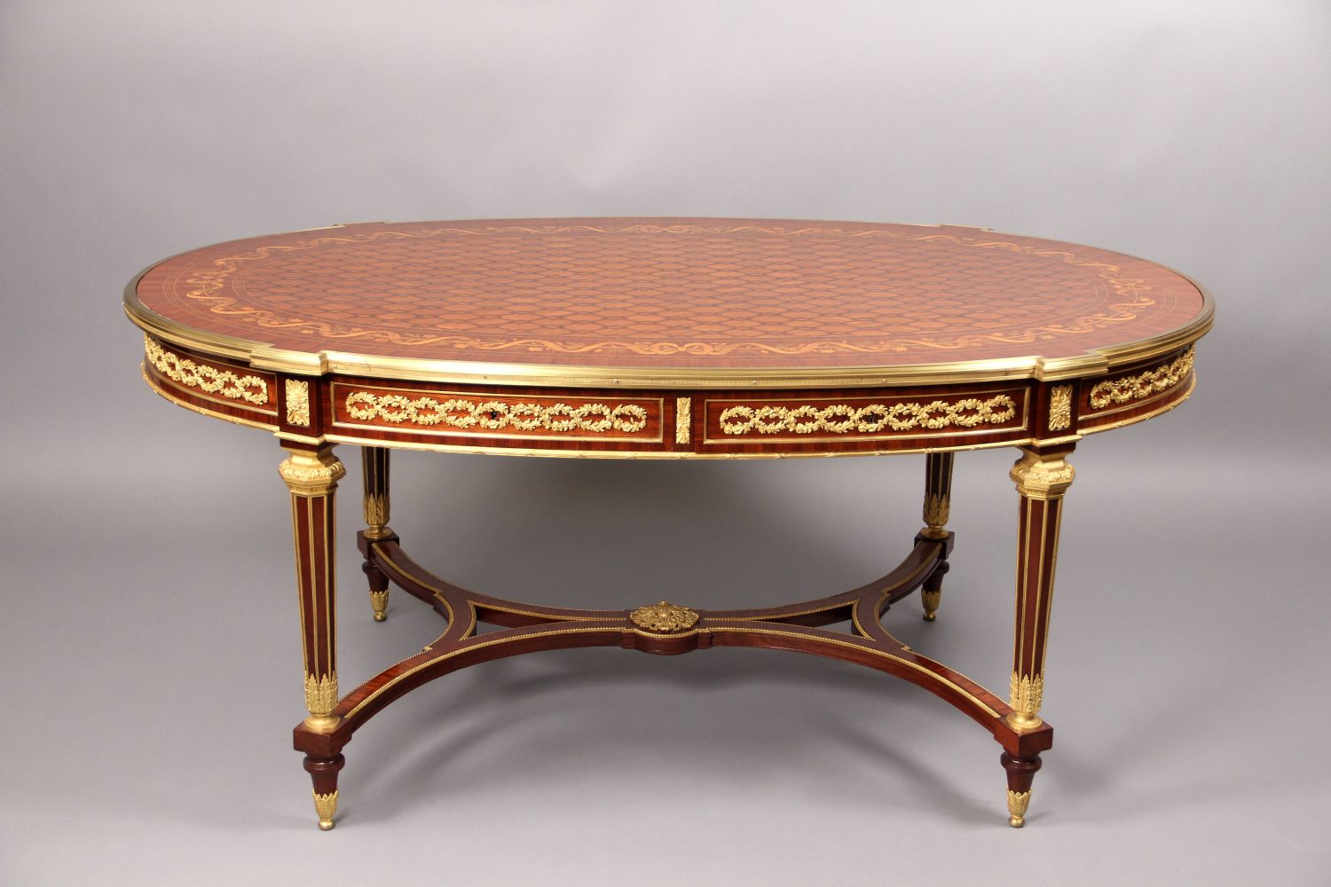 A Rare and Fantastic Quality Late 19th Century Louis XVI Style Gilt Bronze Mounted Inlaid Marquetry and Parquetry Center Table By François Linke