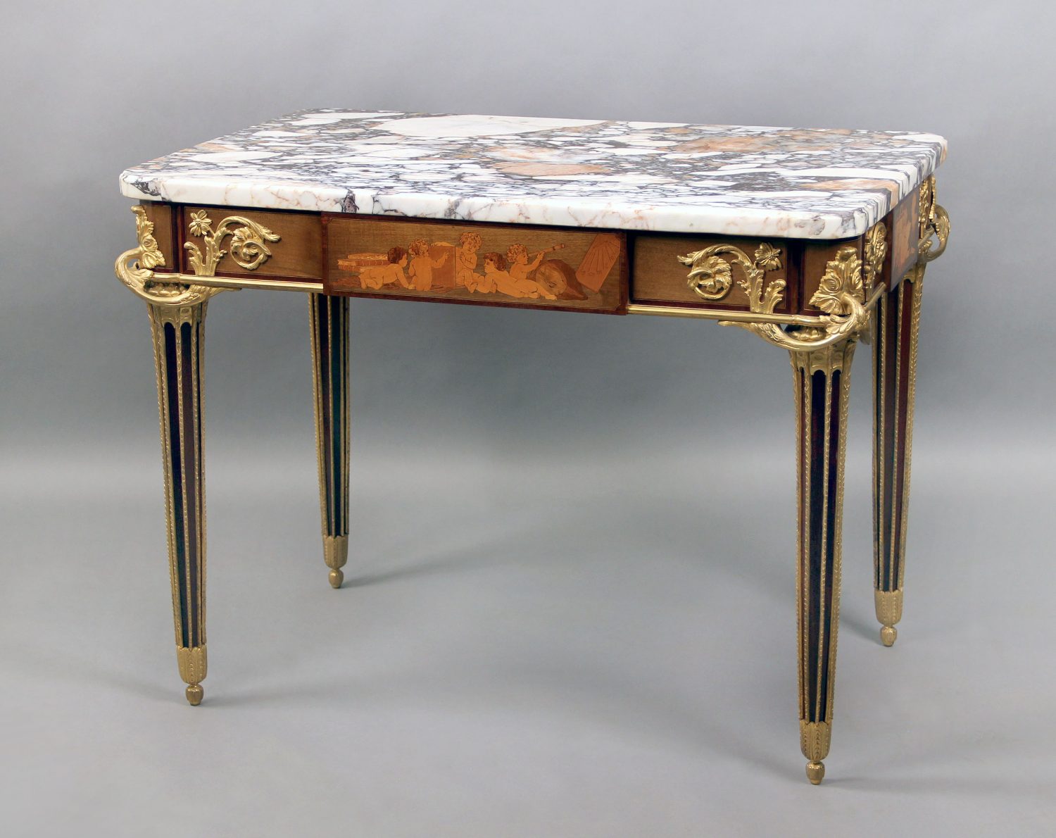 An Exceptional Late 19th Century Louis XVI Style Gilt Bronze Mounted Marquetry Center Table