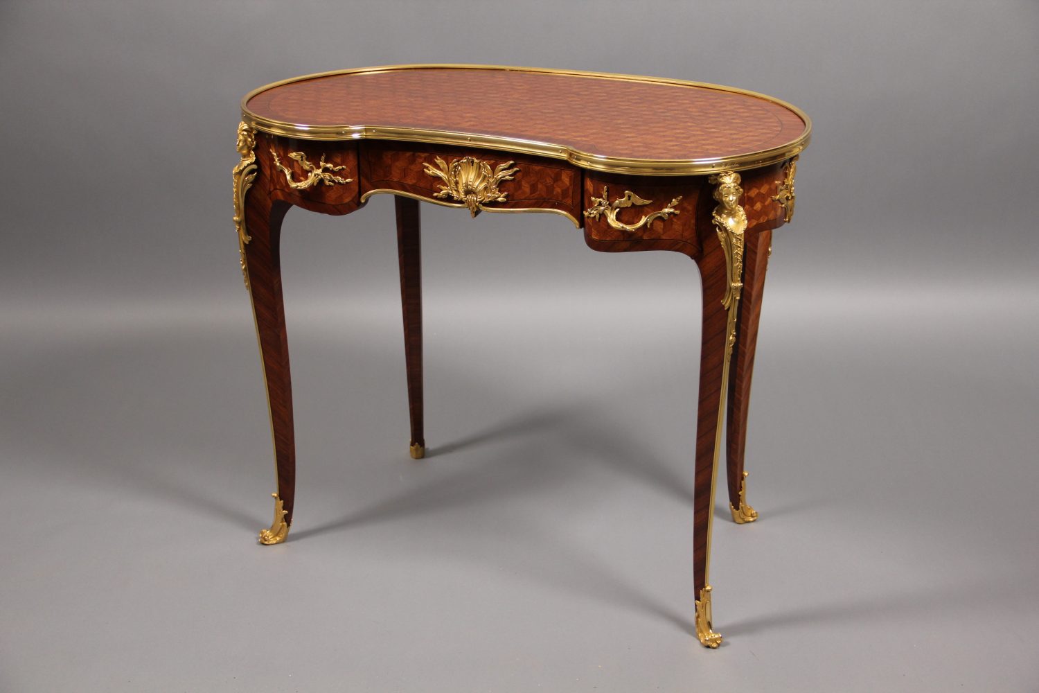 A Fine Late 19th Century Louis XV Style Gilt Bronze Mounted Parquetry Desk