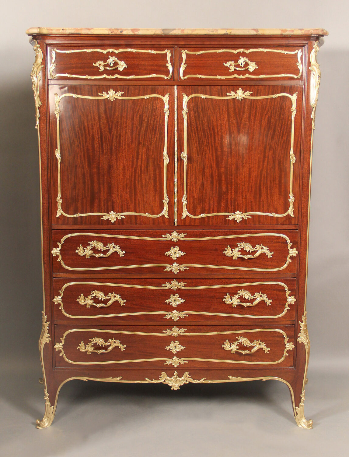 An Early 20th Century Gilt Bronze Mounted Louis XV Style Chest of Drawers By François Linke