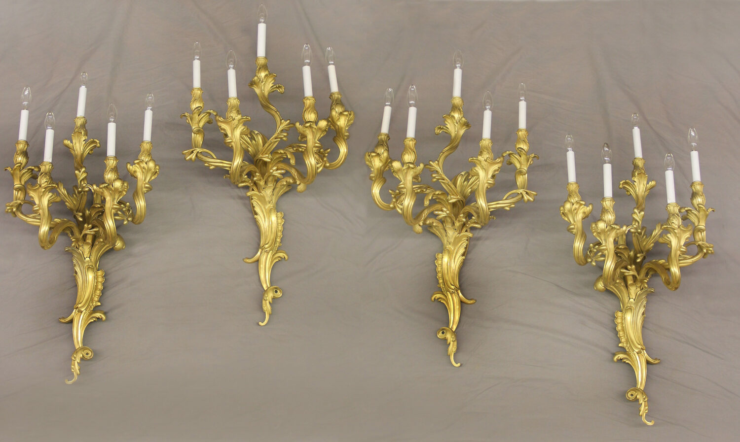 A Very Fine Set of Four Early 20th Century Gilt Bronze Five Light Sconces By Caldwell