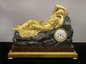 An Important Early 19th Century Gilt and Patinated Bronze Figural Mantle Clock By Andre-Antoine Ravrio